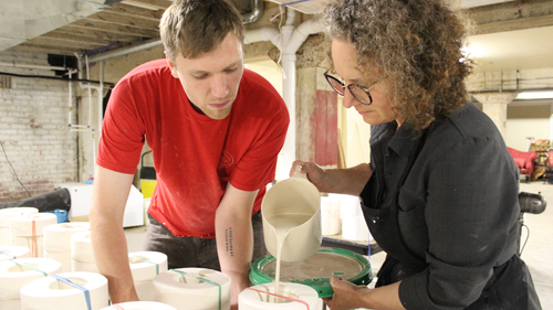 Aaron and Amber making tea cups