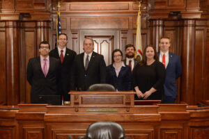 The 2018 Southeastern Illinois College Model Illinois Government team with state senator Dale Fowler in the well of the Illinois senate, from sic.edu