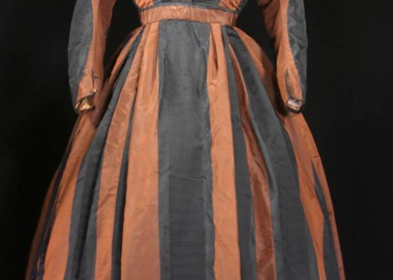 Orange and black historic dress