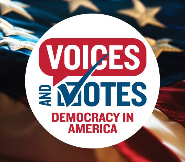 Voices and Votes Democracy in America button pictured over the American flag