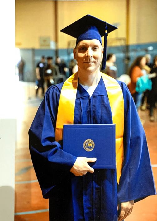 Joseph Dole in cap and gown