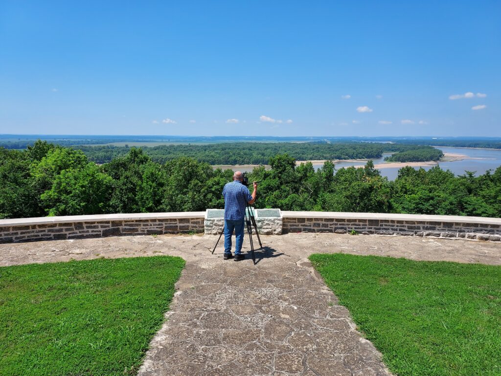Bruce Baldwin, primary videographer/producer for “Kaskaskia and the Pursuit of a More Perfect Union,” films at the overlook at Fort Kaskaskia State Historic Site