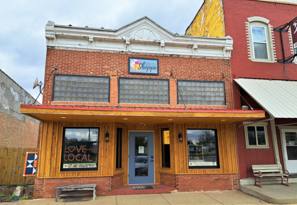 The Community Connection Shoppe with "Love Local" sign in the window