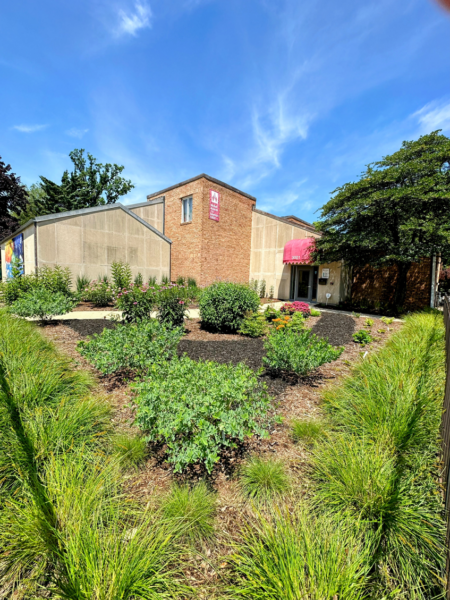 full view of the Mitchell Museum Community Garden